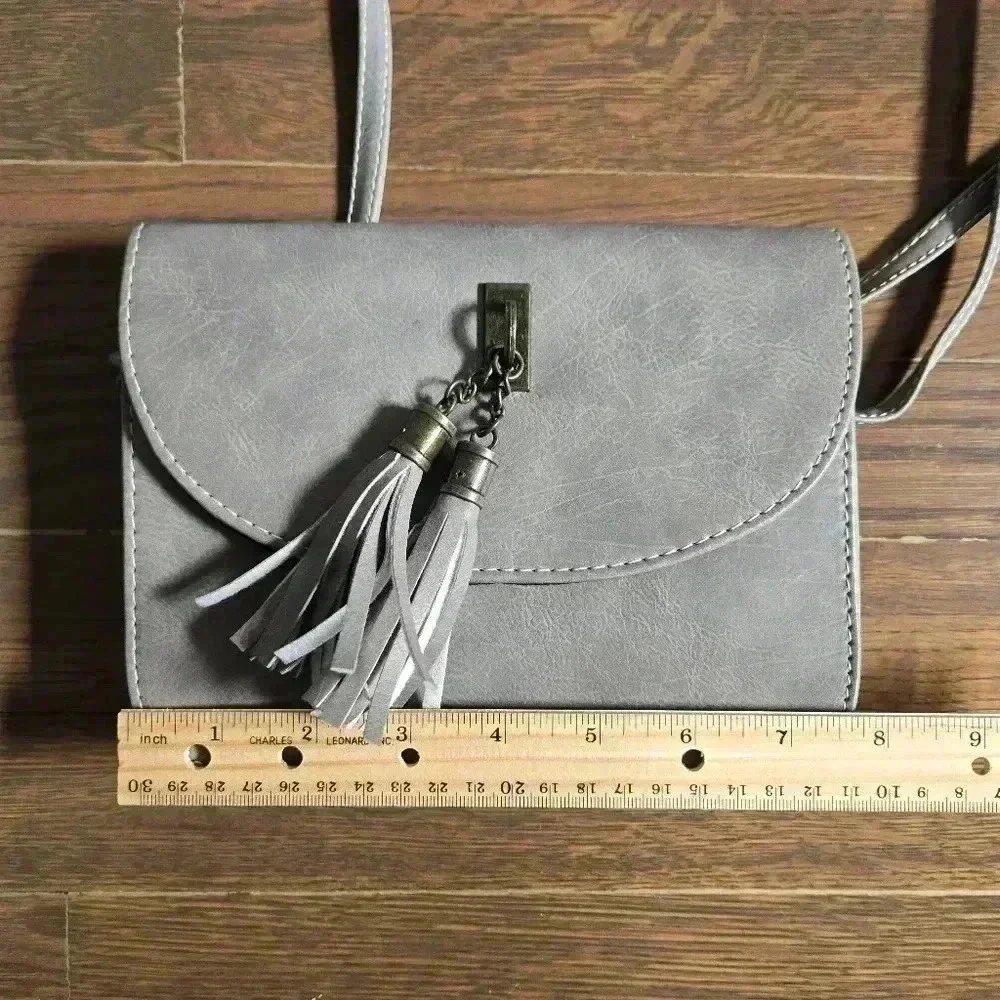 Grey crossbody boho festival bag with tassels from J francis